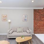 Newly Renovated W Exposed Brick