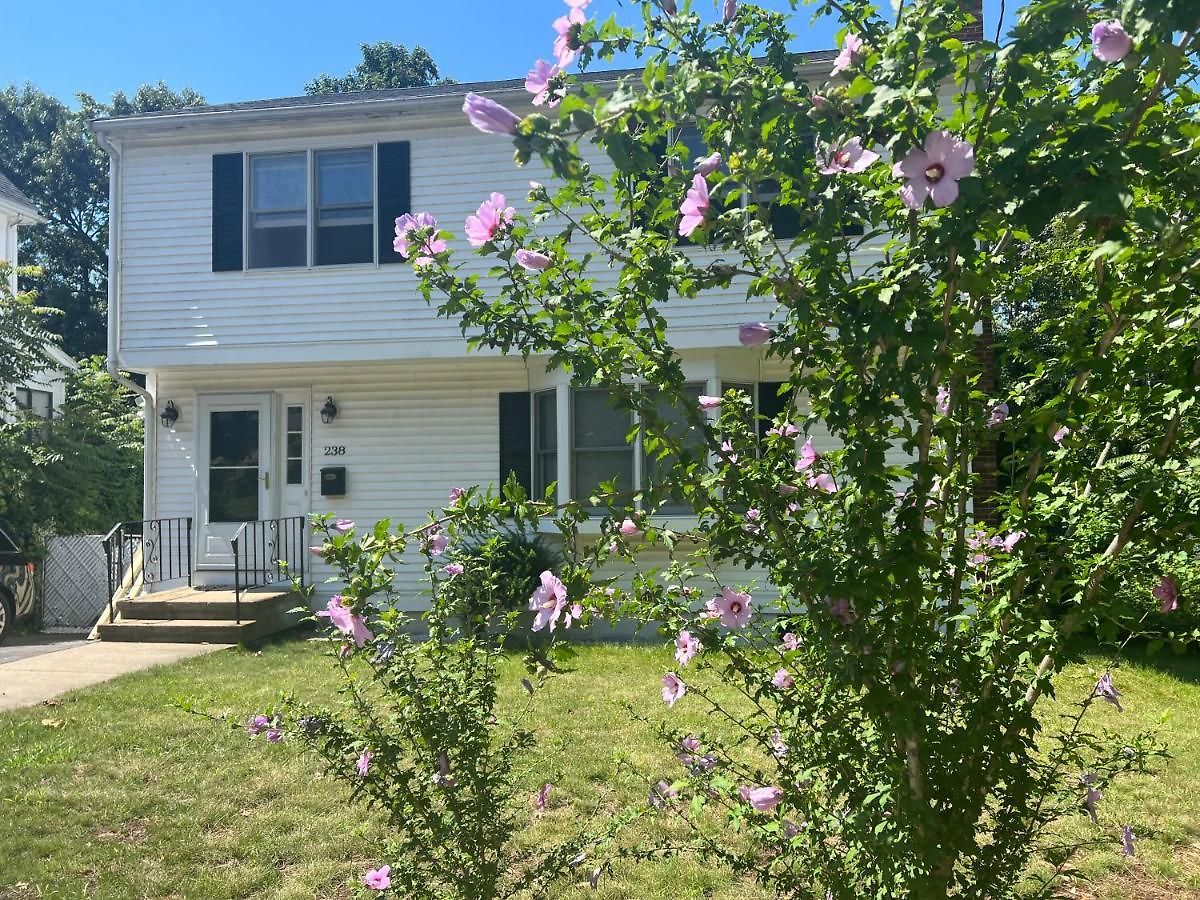 In Single Family House - Suburban Neighborhood In * Boston