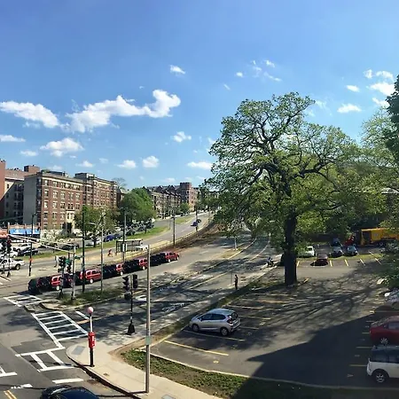 Family In Front Of The Subway With One Parking Spot Apartment