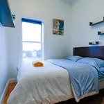 Modern & Spacious 4-bedroom In Roxbury *